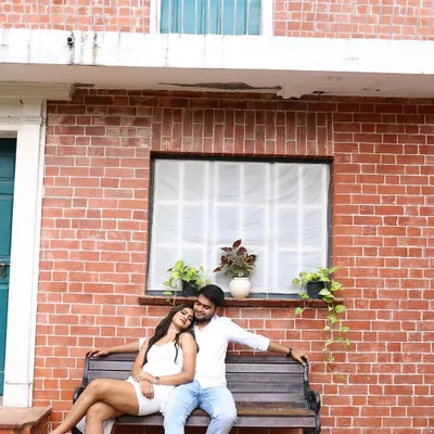 A romantic moment from a pre-wedding shoot. Our client looks beautiful in our simple and elegant white high-low dress, perfect for creating timeless memories.