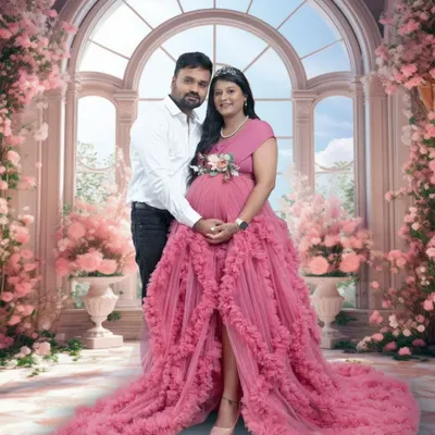 A fairytale moment for a beautiful couple. Dressed in a stunning pink gown, this mama-to-be and her partner are framed by a grand floral arch, enhanced with a touch of AI magic for a truly dreamy effect.