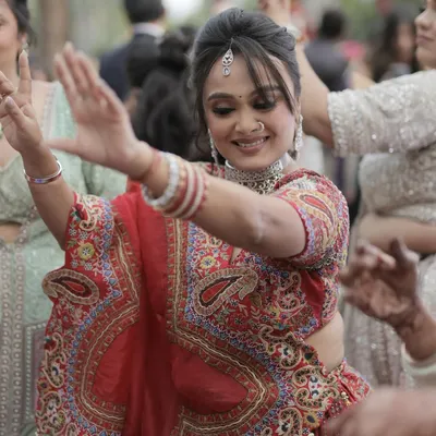 A candid shot of my client dancing and enjoying a family wedding. My makeup is designed to be long-lasting and picture-perfect.