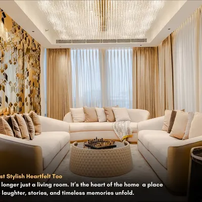 This living room is designed for heartfelt conversations. The stunning gold-accented wall and crystal chandelier create a feeling of pure opulence, while the curved sofas keep the space inviting and comfortable.
