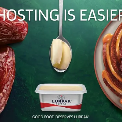 Part of the Lurpak Middle East campaign, this visual pairs the butter with dates and a date pudding. The composition highlights regional flavors, showing the product's versatility in both traditional and modern hosting scenarios.