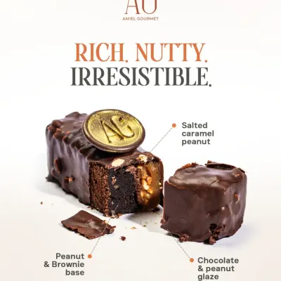 Rich, nutty, and irresistible. This dessert bar features a peanut and brownie base, a layer of salted caramel peanut, and a decadent chocolate and peanut glaze.