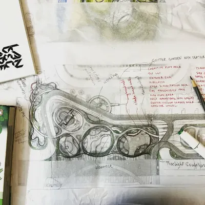 The journey of every great landscape begins with a sketch. Here, we map out concepts for circulation, amenities, and planting zones on tracing paper, laying the foundation for the design.