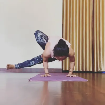 Finding my balance in Parsva Bakasana, or side crow. This pose is a great way to build wrist and core strength, and we break it down into manageable steps in class.