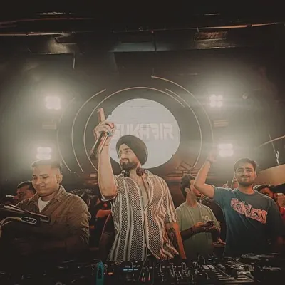 Pointing to the sky, feeling the energy of the crowd. A night to remember at Bee Club in Chandigarh with my crew, making sure the vibe is always on point.