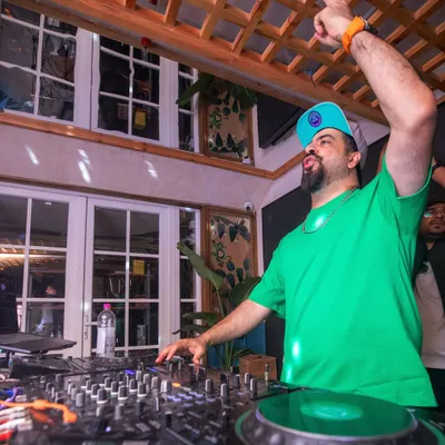 In my element at Monkey Bar, pointing to the crowd and feeling the energy. This is where I belong.