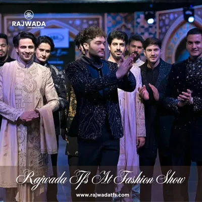 A celebratory moment on the runway as I take a bow with my models. This image captures the energy and success of my fashion show, showcasing a range of my regal ensembles.