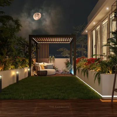 Under a full moon, this rooftop gazebo with soft lighting, tropical landscaping, and cozy lounge seating feels like a private escape. It's a space built for late-night stories and quiet reflection.
