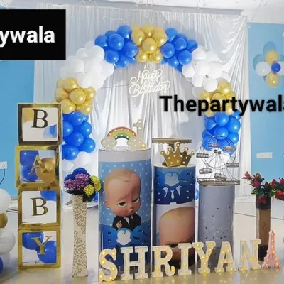 A fun Boss Baby theme for a "Naam Karan" or naming ceremony. The blue, white, and gold balloons, along with character cutouts and themed "BABY" blocks, make it a stylish celebration.