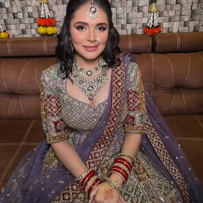 One of my beautiful clients looking absolutely radiant in a unique lavender-grey rental lehenga for her special day. I love helping you find a look that is uniquely you.