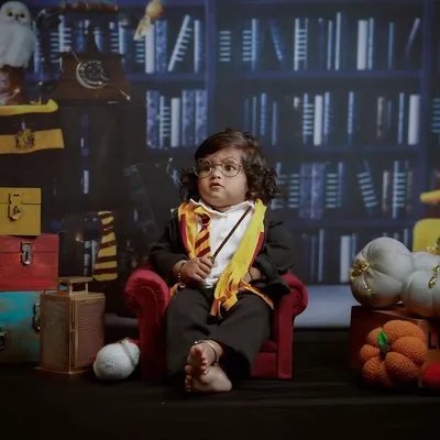This Harry Potter themed photoshoot is one of my most popular requests. I provide the complete set, including the costume and props, to create a truly magical portrait for your little one.