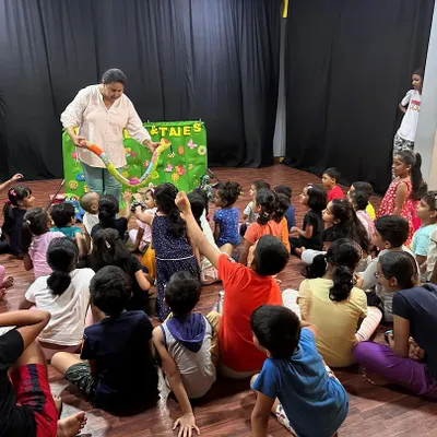 A room full of engaged children at a summer fun event. My puppet shows are designed to be interactive, getting kids to participate in the story.