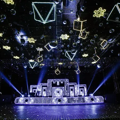 For this Sangeet, we designed a futuristic theme with geometric neon shapes and disco balls suspended from the ceiling, creating a dynamic and electrifying atmosphere for a night of dancing.