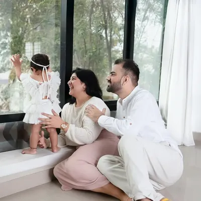 Being a part of your beautiful story is such an honor. This candid moment of a family looking out the window together is what lifestyle family photography is all about.