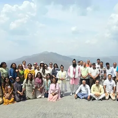 Our happy group of spiritual seekers during the Himachal Pradesh retreat, with the majestic mountains providing a powerful backdrop for our soul journey.