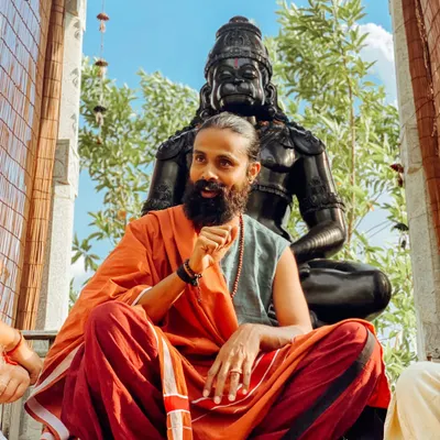 I sit before the statue of Hanuman, sharing the philosophical teachings of yoga. My goal is to help you understand that you cannot start the next chapter of your life if you keep rereading the last one.