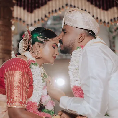 A beautiful, intimate moment between the bride and groom during their wedding ceremony. I focus on capturing the quiet connections amidst the celebration.