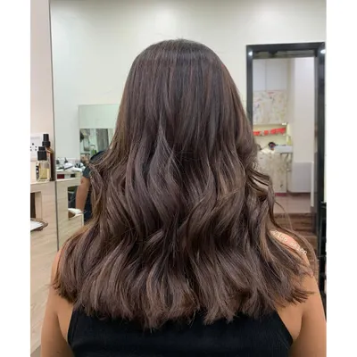 These subtle brown highlights give the illusion of a global color but with more dimension and a softer grow-out. The result is rich, healthy-looking hair with beautiful movement.