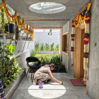 A perfect circle of sunlight from a skylight illuminates a morning ritual. This is how we design with light, creating moments of beauty and connection in everyday life.