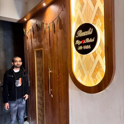 A grand entrance for a home at Amrapali Princly Estate. I designed this custom door and the backlit nameplate to create a welcoming and impressive entryway.