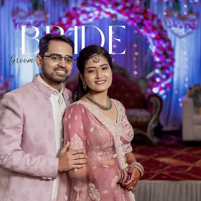 Deepa and Pawan in a classic portrait against their vibrant event decor. This shot balances a formal pose with their natural, happy expressions.