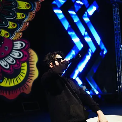 In my zone. A shot of me on the mic, completely focused on the music and the crowd's reaction during a live performance.