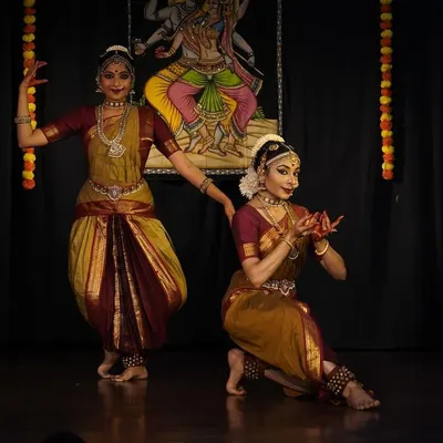 A moment of perfect synchronicity during a duet performance for World Dance Day. Dancing with a partner brings a unique dynamic of contrast and connection to the stage.