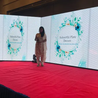 A very special moment for me, accepting the 'Best Wedding Craft' award on stage at the Kovai Business Awards 2022. I am so grateful for the support that made this achievement possible.