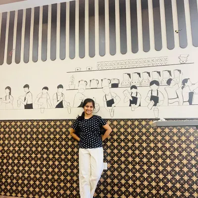 We created this fun, illustrative mural for Barista Bean Coffee in Mysore. The line art depicts the entire coffee-making process, adding a unique story and character to the cafe's interior.
