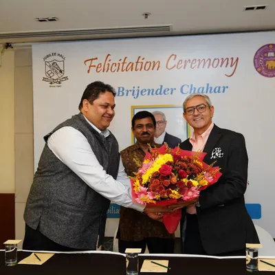 It was a privilege to felicitate the newly appointed "Additional Solicitor General of India", Shri Brijender Chahar Ji. Here I am presenting him with a bouquet at the ceremony at the India Habitat Center.