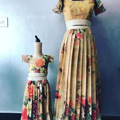This matching floral crop top and pleated skirt set is a great example of a twinning outfit for mom and child. I take measurements for both to ensure a comfortable and flattering fit.