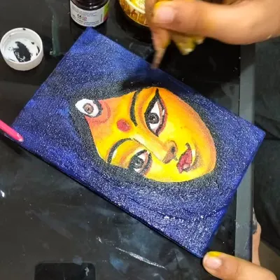 Here's a glimpse of a more advanced canvas painting session. This piece, inspired by traditional Indian art, shows how we guide older children to develop their artistic skills.