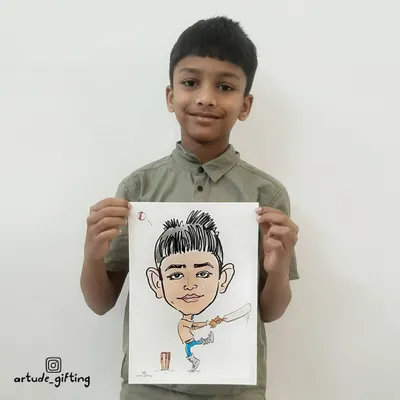 This young man is proudly showing off his cricket-themed caricature. It's always fun to draw kids with their favorite sports and hobbies.