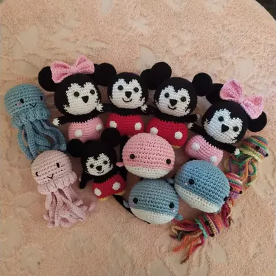 The whole gang is here! This photo shows a large custom order I completed, featuring Mickey and Minnie Mouse, jellyfish, and whales all together. It's a great example of the variety I can offer.