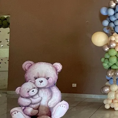 A cute teddy bear cutout prop, part of our decor for a baby boy's welcome home party. These small details add charm and character to the overall theme.