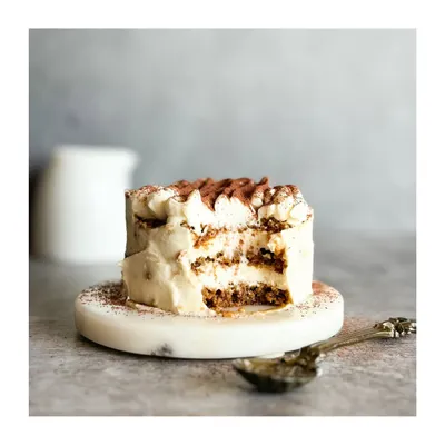 A beautiful shot of our gluten-free Tiramisu, perfect for all coffee lovers. It's eggless, contains no alcohol, and has that delightful coffee kick.