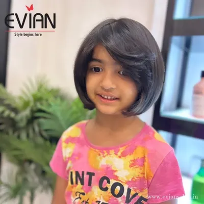 A beautiful shot of this little girl's new bob haircut. The style is neat, chic, and perfect for keeping her hair healthy and out of her eyes.