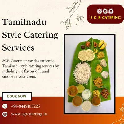 A beautifully arranged Tamil Nadu style sadhya on a banana leaf. This overhead shot shows the variety of dishes, including rice, appalam, poriyals, and curries in bowls, that make up an authentic feast.