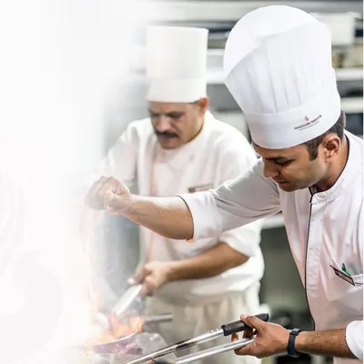 A chef's masterpiece, served with elegance. Our team of chefs works with precision and passion, crafting every dish to perfection.