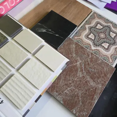 Every project begins with a feeling, which I translate into a palette of materials. This mood board explores a combination of rich woods, patterned tiles, and different marbles, laying the groundwork for a kitchen full of texture and warmth.