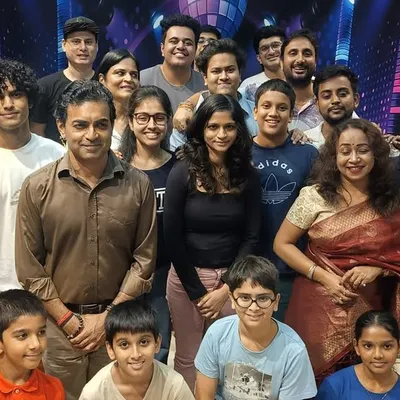 Our students and teachers gathered for a group photo during a certificate ceremony. More than just an academy, we are a 'parivaar' or family, celebrating every milestone together.