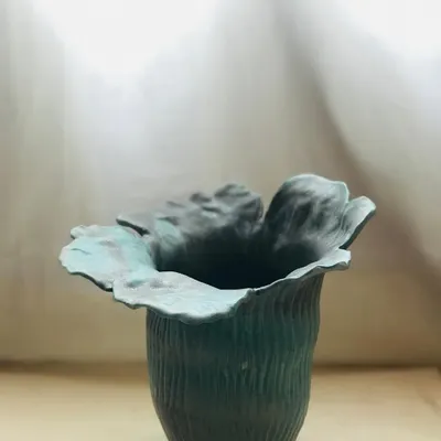 The Wild Petal Vase, a bloom frozen in clay. Each one is hand-built with love and irregularity, because beauty rarely blooms in straight lines.