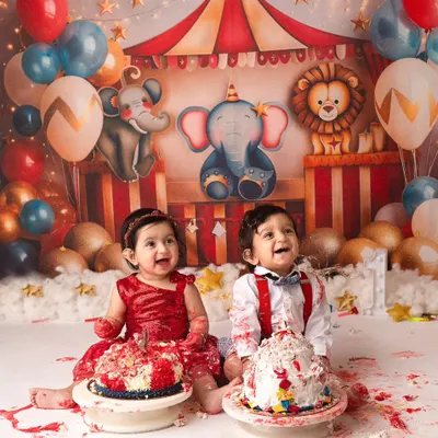 Double the fun and double the smiles! These adorable twins had the best time at their circus-themed first birthday cake smash. It was such a joy to capture their happy, messy celebration.