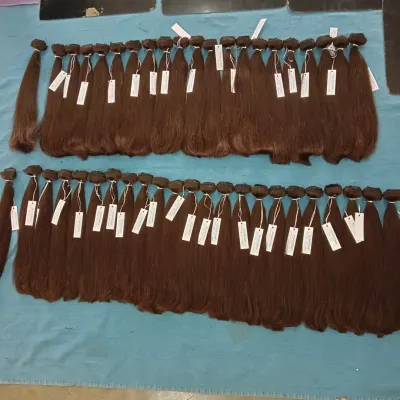 Here is a fresh batch of high-quality dark brown human hair, tagged and ready for my wholesale partners. Running a factory means I can ensure a consistent supply of popular products for your business.