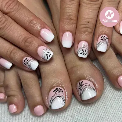 A matching manicure and pedicure. This client chose a beautiful French ombré with delicate, hand-painted black leaf designs.