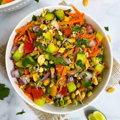 This Moong sprout and beetroot salad is a fantastic, protein-packed meal for anyone. It's easy to make by mixing sprouts with fresh vegetables like tomato, cucumber, and carrots for a nutritious lunch.