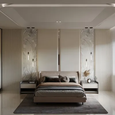 This master bedroom is a study in symmetry and tranquility. The bed is flanked by two large marble panels with integrated wall sconces, while a coffered ceiling with ambient lighting adds a sense of height and grandeur to the restful space.