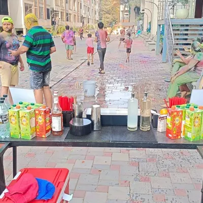 A simple and practical bar setup for a vibrant Holi party. We make sure everyone stays refreshed during the festivities.