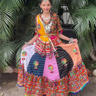 Perfect for young dancers, this multi-colored chaniya choli is bright, fun, and comfortable. The full outfit, including the jewelry, is available to rent.