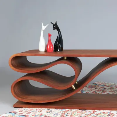 The SWISH bench is our contemporary take on seating, crafted from flexible plywood. Inspired by the fluidity of running water, its elongated, curved sheets create a dynamic and organic form that is both a bench and a sculpture.